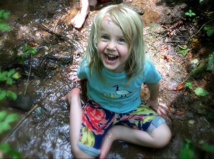 Playing_at_Two_Sisters_Farmstead_School.jpg